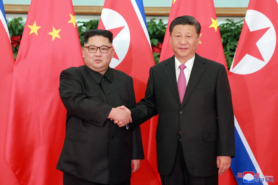 Kim Jong-un en Xi Jinping in 2019. 