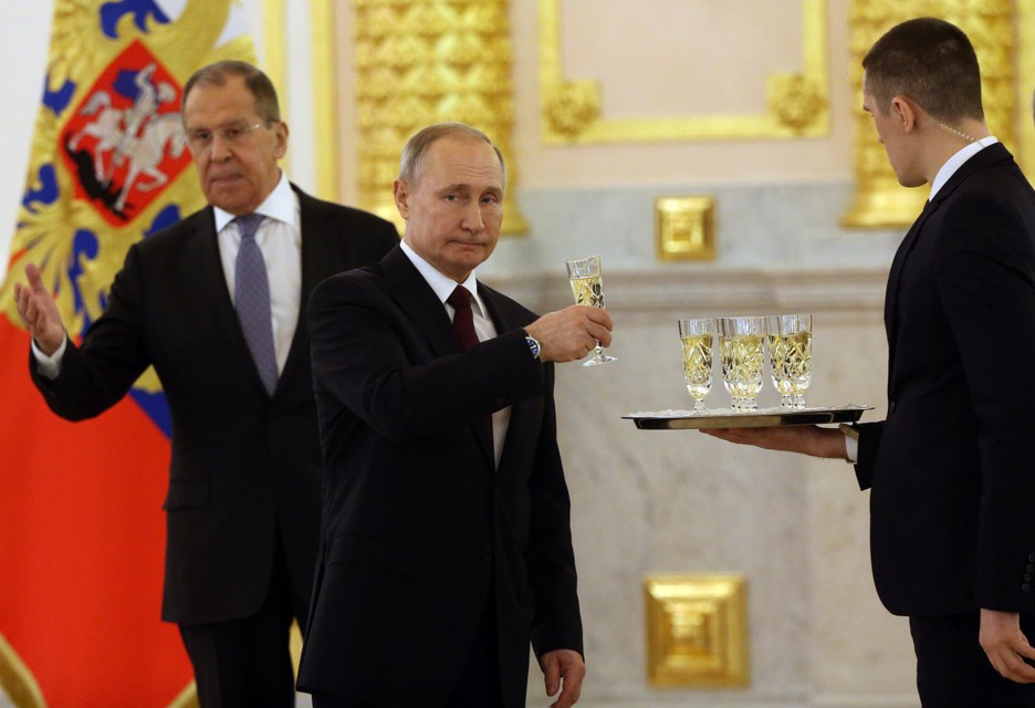 President Poetin en minister van Buitenlandse Zaken Lavrov. 